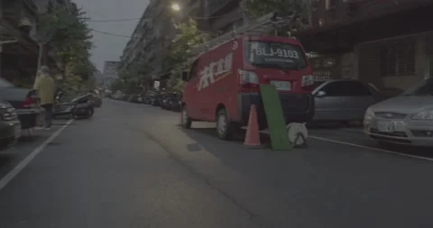 Red Cable Television Service Van On The Side Of An Old Urban Street(Ungraded) Video stock 226375320