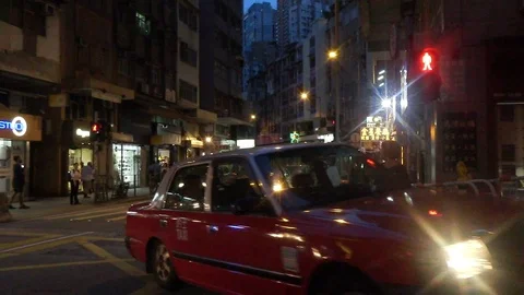 Red cabs in Hong Kong 库存影片 100799058