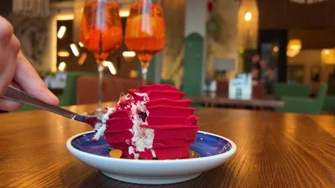 Red cake with cream and raspberry flavor, a piece of sweet dessert red cake with Stock Footage 312011973