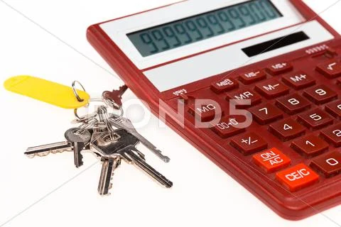 The red calculator with a keys on a white background Stock Photos