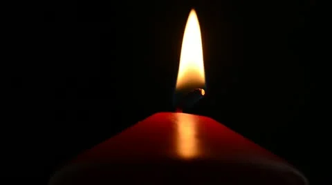 Red candle on a black background Stock Footage 21725536