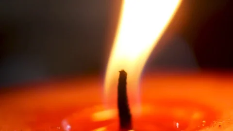 Red candle burning in 4k Video stock 128942734