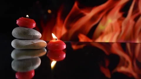 Red candle burning on black background Stock Footage 167598656