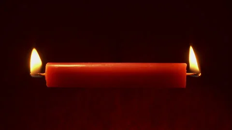 Red candle burning  at both ends,   jm0305 動画素材 35335691