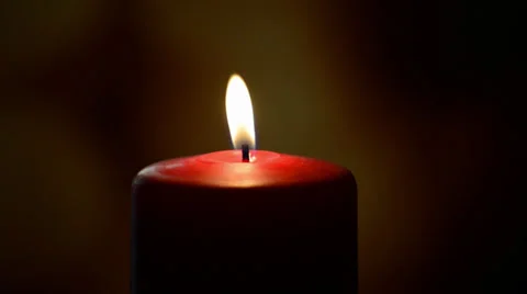 Red candle burning Stock Footage 29571630