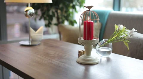 Red candle burning on table Stock Footage 67456514