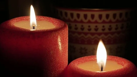 The red candle burns. Close-up, top view. Stock Footage 84852904