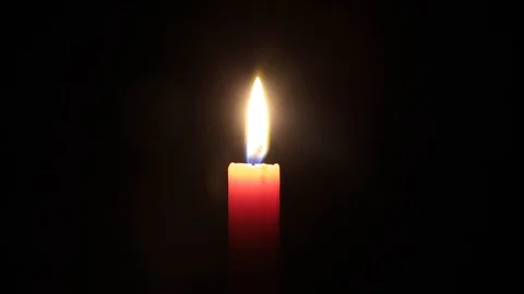 Red candle burns Stock Footage 129358016