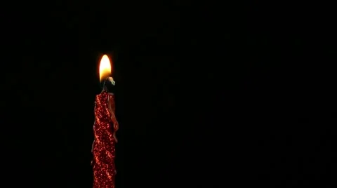 Red candle in the dark Stock Footage 68874025
