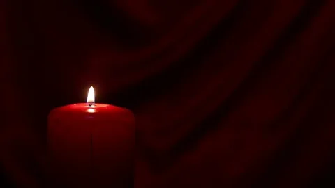 Red candle at dark Stock Footage 73432660