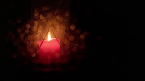 Red candle in heavy rain Video stock 292833571