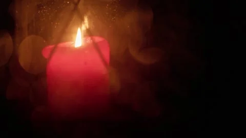 Red candle in heavy rain Video stock 292833573