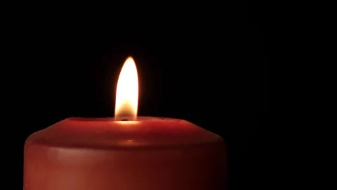 red candle rotates 360 degrees on black ... | Stock Video | Pond5