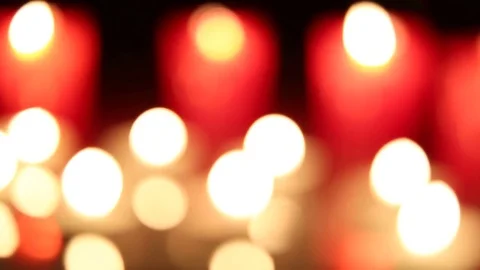 Red Candles Burning And Shimmering In The Dark Stock Footage 84981444