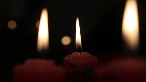 Red Candles Burning in Darkness 스톡 동영상 343797907