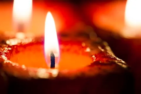 Red candles out of focus Stock Photos