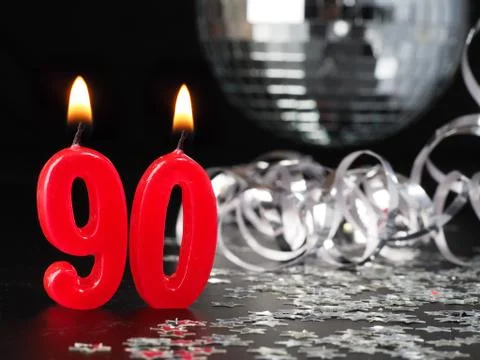 Red candles showing Nr. 90 Foto stock