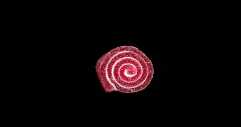 Red Candy Marmalade Rotates on Black Background. Jelly Chewy Sweets Spins. .. Stock Footage 308668008