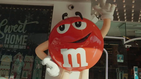 Red candy mascot statue at a store entrance close up in Las Vegas Stock-Footage 347837183