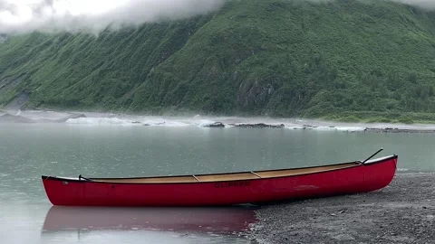 Red canoe and ice caps in Valdez Alaska Stock Footage 237494935