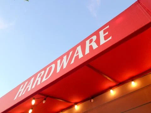 Red canopy awning hardware store with bulbs abstract background Stock Photos