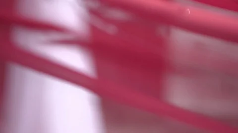 Red canvas develops in the wind near the arch for the newlyweds Video stock 104783461