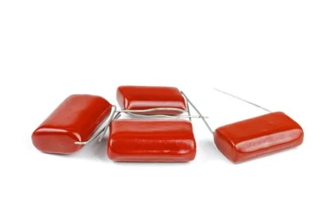 Red capacitor isolated on white background Stock Photos