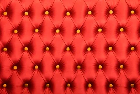 Red capitone with golden buttons texture 스톡 사진