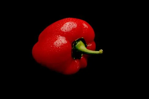 Red capsicum on black background Stock Photos