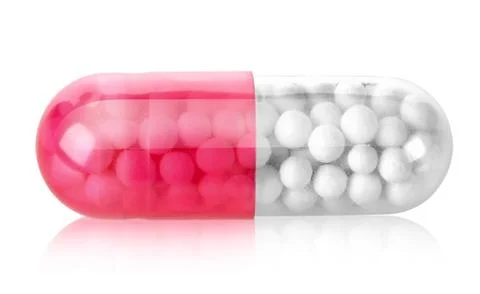 Red capsule Stock Photos