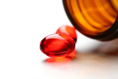 Red Capsules Stock Photos