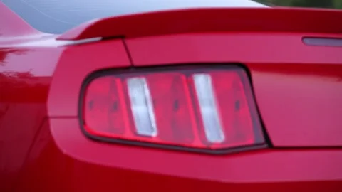 Red car brake light close up view Stock Footage 160569790
