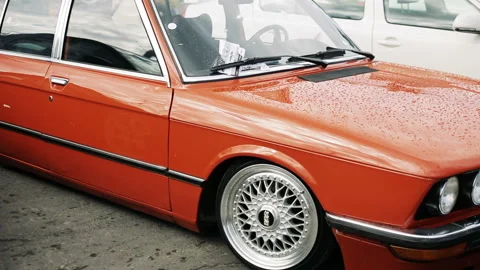 Red car on cast wheels Video stock 93500452