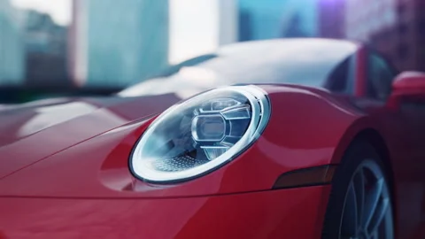 Red car close-up flashing headlights in an urban environment camera movement  Stock-Footage 232204150