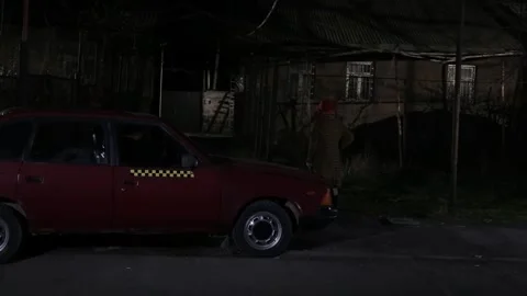 Red car in the  dark 2 Stock Footage 323000309