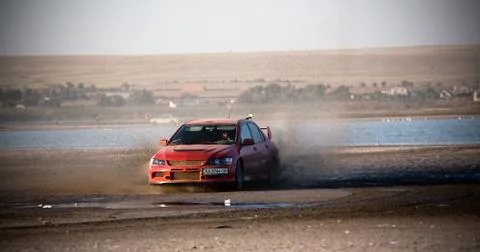 Red car dirt drift Stock Photos