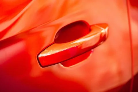 Red Car door handle Using wallpaper or background Stock Photos