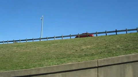 Red car driving Video stock 12628679