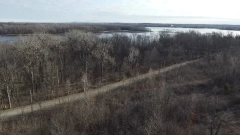 Red Car Driving in Winter, Camera Pulls Away Stock Footage 232741159