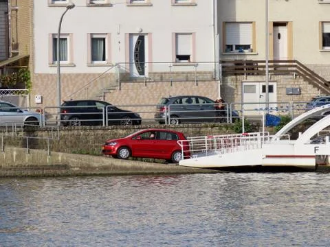 Red car on ferry Stock Photos