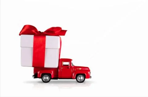Red car with a gift box on a isolated white background. Stock Illustration
