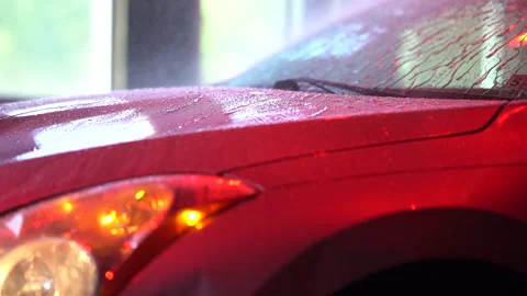 Red Car Going Through Automated Car Wash Stock Footage 155763611