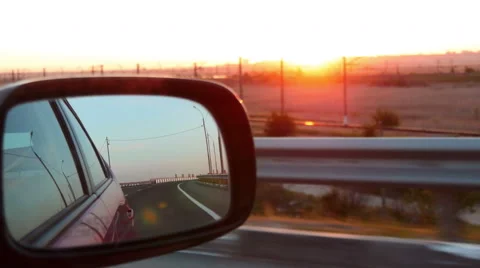 Red car moving on the road Stock Footage 50327695