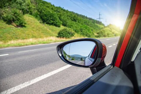 Red car on the road. Stock Photos