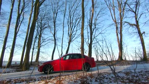 The red car from the side Stock Footage 148096477