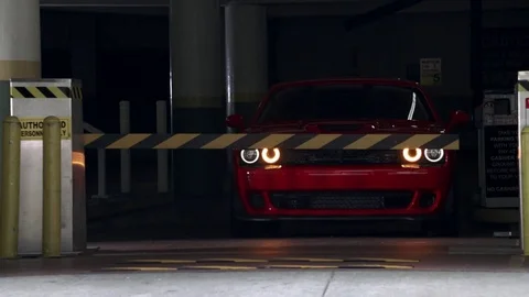 Red Car Smashing Gate Video stock 81495302