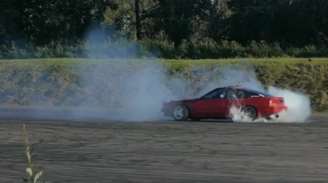 Red car spins out of control at drift racing event. 스톡 동영상 59747271