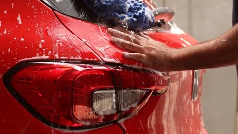 Red car wash with pressure washer 스톡 동영상 123799713