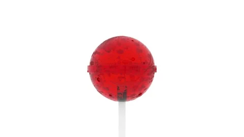 Red caramel on a stick rotates counterclockwise on a white background. Stock Footage 144016552