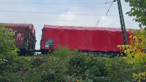 Red Cargo Train Wagons on Track in Germany Stock Footage 339753147